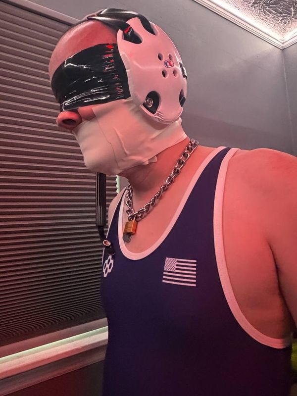 A closeup of me blindfolded and gagged with tape.